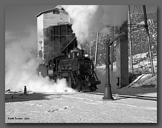 Nevada Northern Locomotive #93 steams towards a waterplug in the East Ely, NV yard.